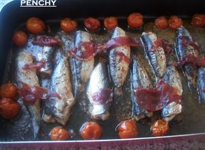 Foto principal de Sardinas al horno con tomates cereza y jamón ibérico al cava