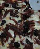 Pizza de pato y arándanos