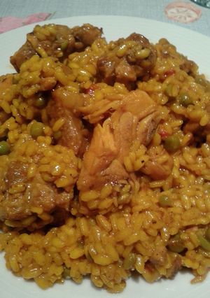Una foto de Arroz de pollo con cerdo