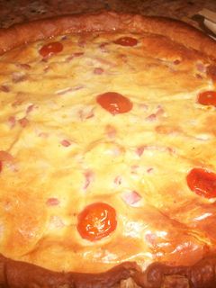 Una foto de Quiche de bacon y tomates cereza
