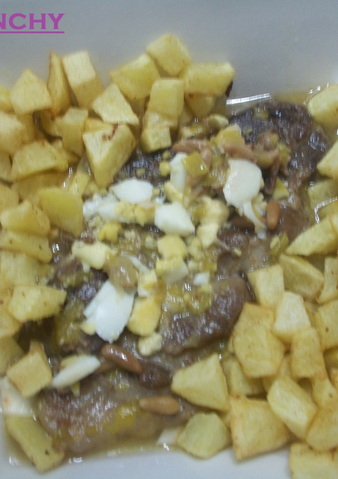 Una foto de Chuletas de aguja en salsa