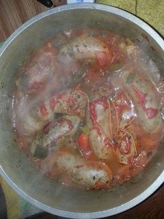 Una foto de Chorizo a la pomarola con vino