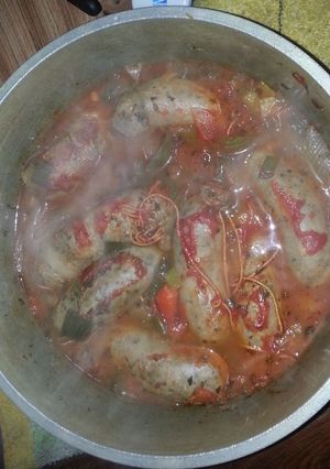 Una foto de Chorizo a la pomarola con vino