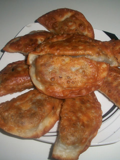 Foto principal de Empanadillas fritas de morcilla, huevo y piñones