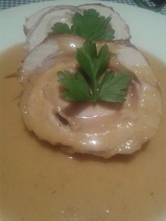 Una foto de Redondo de cerdo en salsa