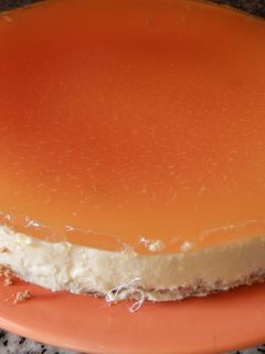 Una foto de Tarta de queso y naranja