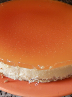 Una foto de Tarta de queso y naranja