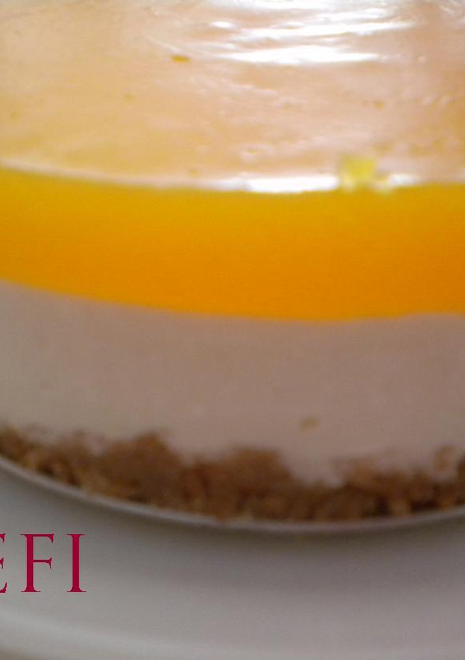 Una foto de Tarta de queso y zumo de naranjas