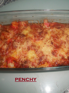 Una foto de Pastel gratinado de calabacín, atún y surimi