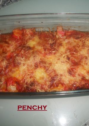 Una foto de Pastel gratinado de calabacín, atún y surimi