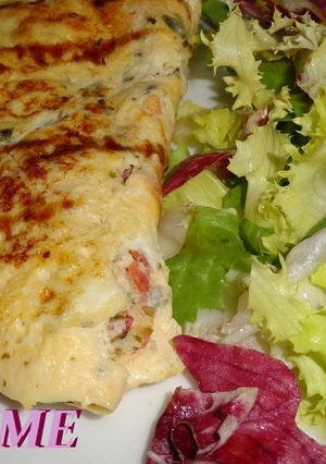 Una foto de Tortilla de queso fresco y tomate