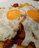 Huevos a la plancha con patatas y chistorra