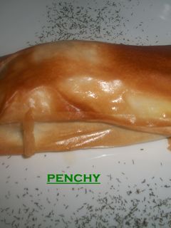 Una foto de Salmón con cebolla caramelizada en masa filo