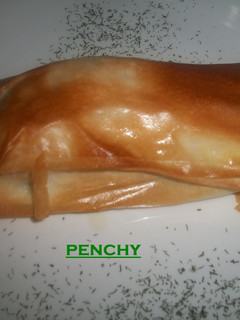 Una foto de Salmón con cebolla caramelizada en masa filo