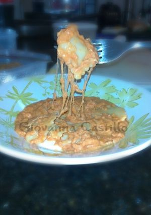 Una foto de Salsa de tomates y queso para raviolis