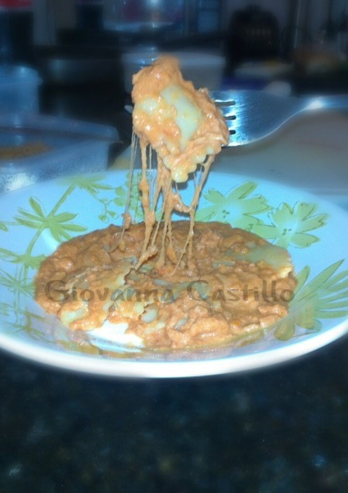 Una foto de Salsa de tomates y queso para raviolis