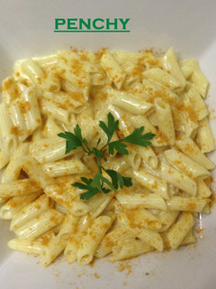 Una foto de Macarrones al Curry con leche de coco