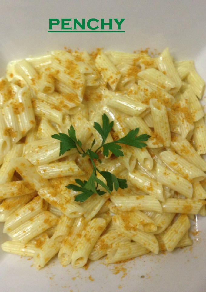 Una foto de Macarrones al Curry con leche de coco