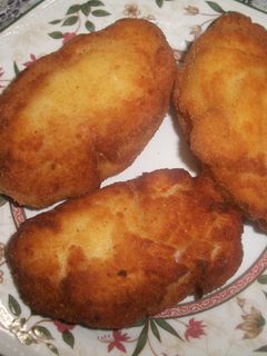 Una foto de Calabacines rellenos envueltos en bechamel crujiente