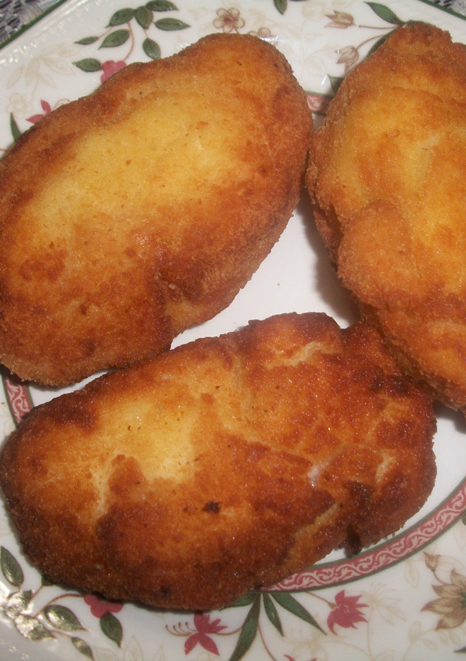 Una foto de Calabacines rellenos envueltos en bechamel crujiente