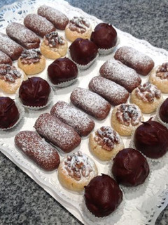 Foto principal de Panellets de chocolate, vainilla y coco bañado en chocolate