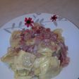 Tortellini con salsa bacon y cebolla caramelizada