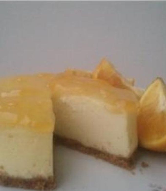 Una foto de Cheesecake de naranja y limón