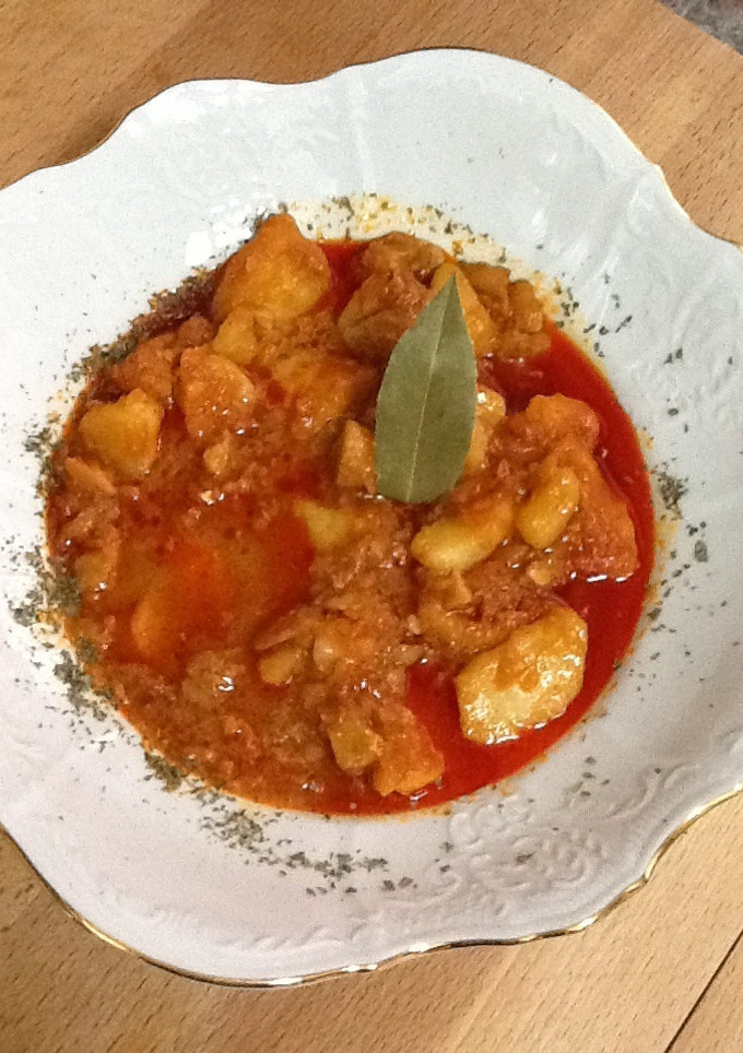 Una foto de Bacalao con cachelos y pimentón