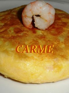 Una foto de Tortilla de patatas y langostinos