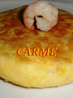 Una foto de Tortilla de patatas y langostinos