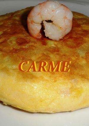 Una foto de Tortilla de patatas y langostinos