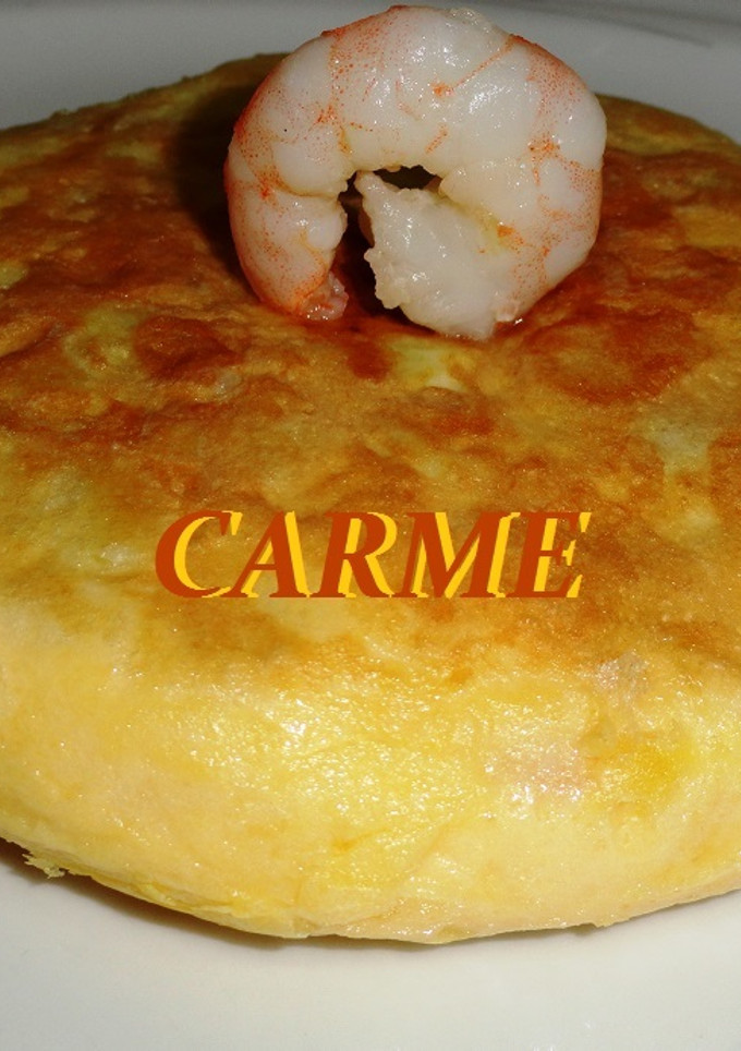 Una foto de Tortilla de patatas y langostinos