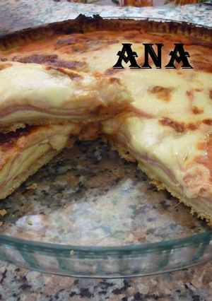 Una foto de Tarta de paleta y queso con crema de cebolla