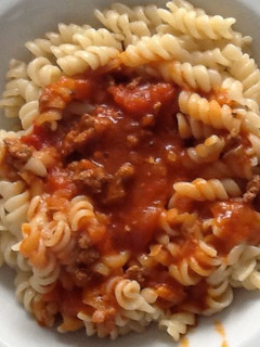 Una foto de Fusilli con salsa bolognesa