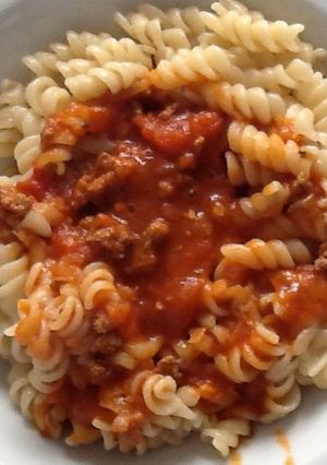 Una foto de Fusilli con salsa bolognesa