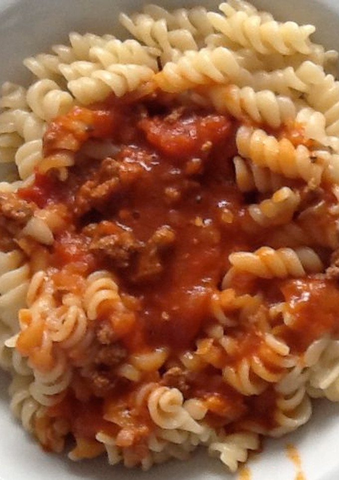 Una foto de Fusilli con salsa bolognesa