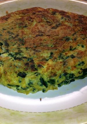 Una foto de Tortilla de espinacas, cebolla y queso
