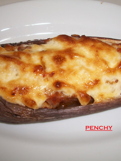 Una foto de Berenjenas con bacalao gratinadas al ali oli
