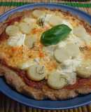 Pizza integral de quesos al romero