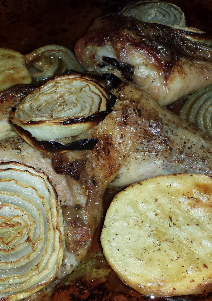 Una foto de Muslo y contramuslo asado al horno