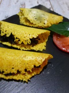Una foto de Canapé de galleta de queso y morcilla
