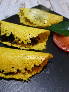 Una foto de Canapé de galleta de queso y morcilla