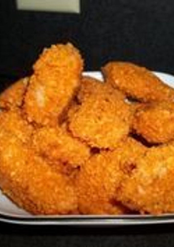 Una foto de Pollo apanado con doritos