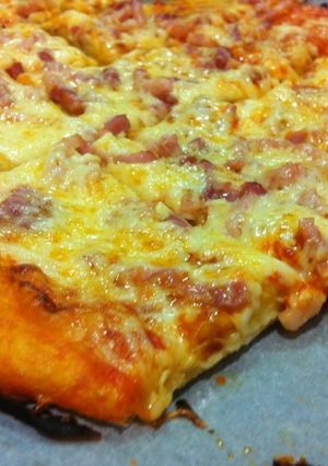 Una foto de Pizza casera de bacón