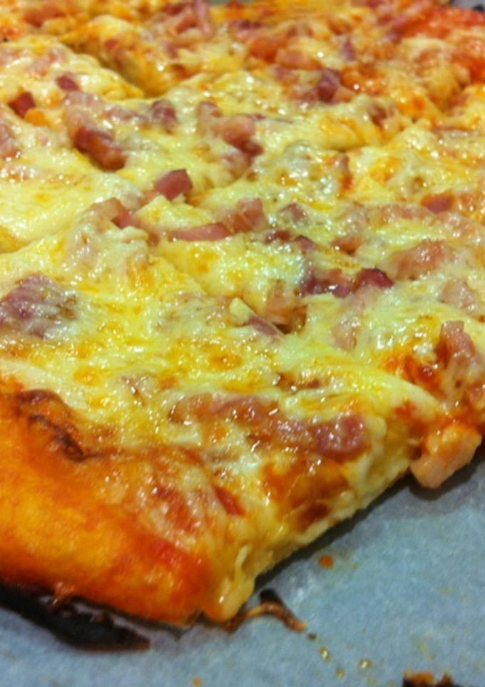 Una foto de Pizza casera de bacón