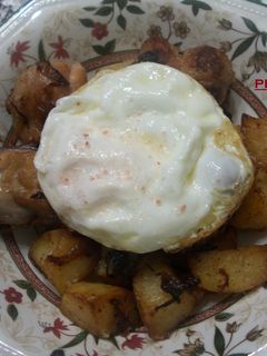Una foto de Pollo frito encebollado