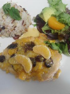 Una foto de Pechugas de pavo en salsa de mandarina con arándaros