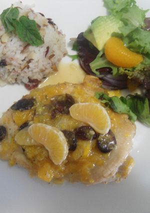 Una foto de Pechugas de pavo en salsa de mandarina con arándaros