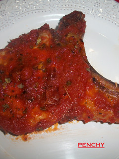 Una foto de Chuletas de cerdo a la pizzaiola