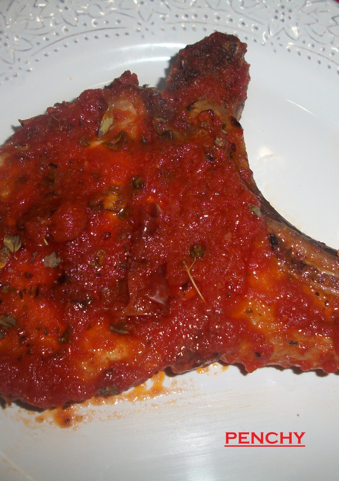 Una foto de Chuletas de cerdo a la pizzaiola